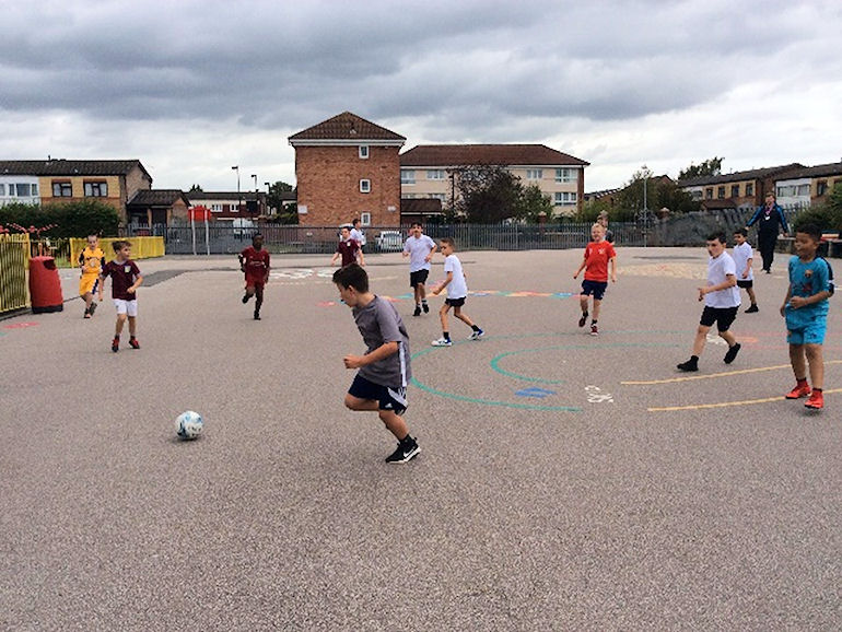 A football match on the school playground