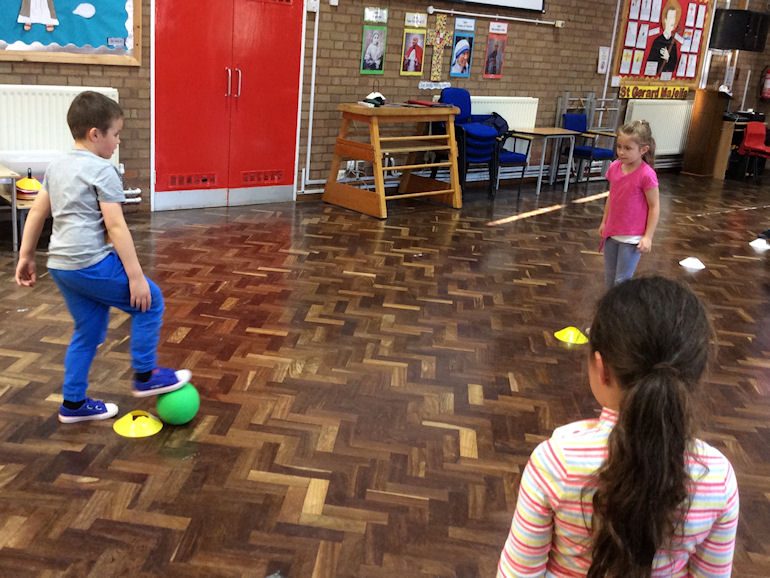 Children playing indoor multi-skills games